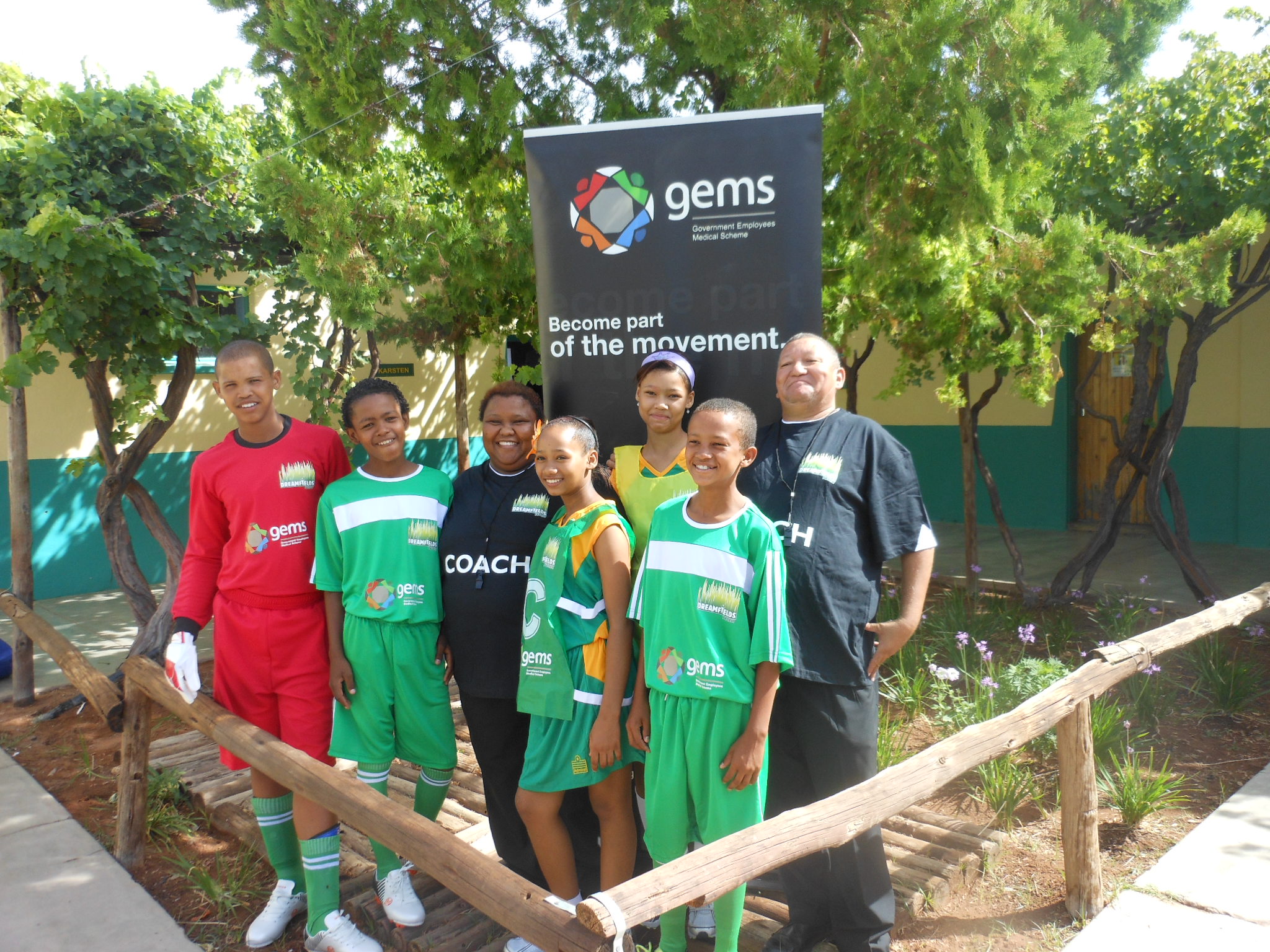 Soverby Primary School sports coaches, Ms R Van Rooyen andMr Van Wyk with soccer and netball team captains. 